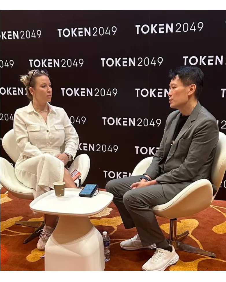Irina Heaver with Binance CEO Richard Teng, discussing cryptocurrency regulation, digital asset compliance, and Web3 legal strategy in the UAE and global markets