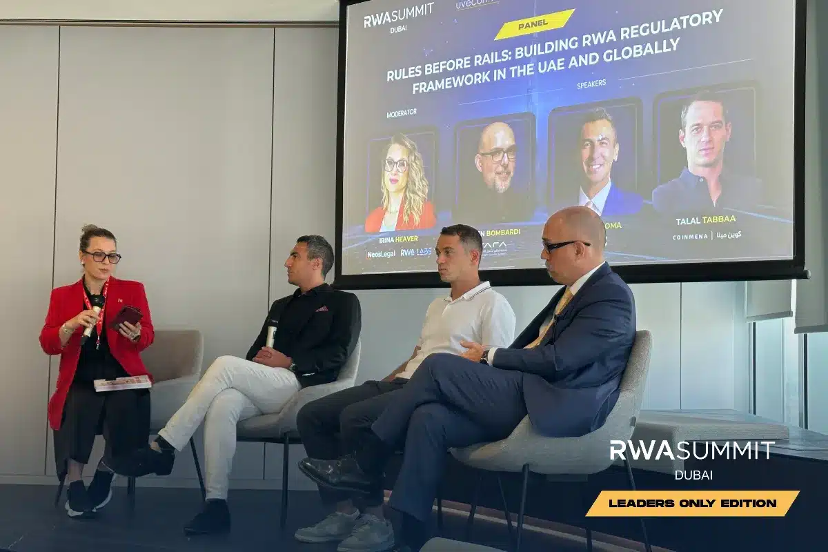 Irina Heaver moderating the 'Rules Before Rails: Building RWA Regulatory Framework in the UAE and Globally' panel at RWA Summit Dubai 2026 Leaders Only Edition, with industry leaders from DMCC, VARA, and CoinMENA discussing crypto regulation and digital asset compliance