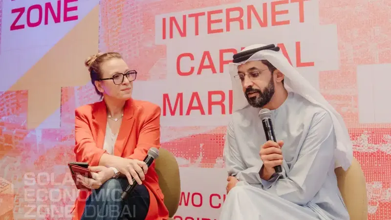 Irina Heaver and Ahmed Bin Sulayem at Solana SEZ Dubai event, UAE, discussing blockchain regulation, Solana ecosystem development, and Web3 legal strategy in the Middle East